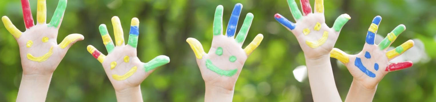 Children's hands in the air.