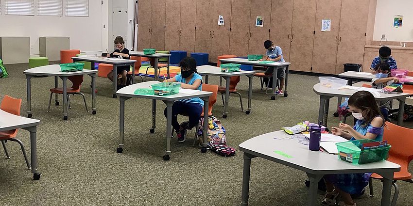 students in classroom with masks on