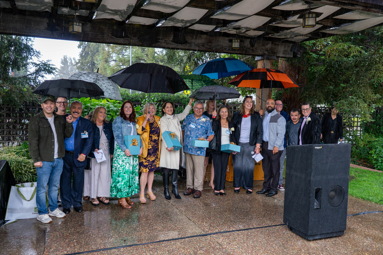 CUSD's 2026 retirees gather together in the rain for a retirement celebration
